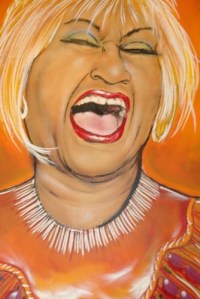 Beautiful painting of Celia Cruz hanging inside of the shop